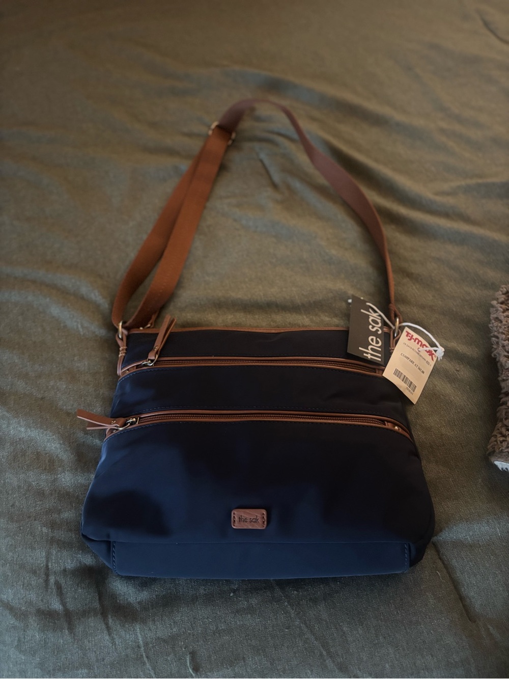 The Sak Navy Crossbody with Brown Strap and Trim